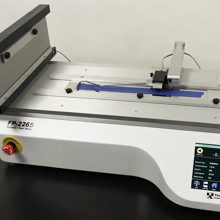 FP-2265 180 Degree Peel test on the special fixture for 90 degree peel that can also accommodate COF testing.